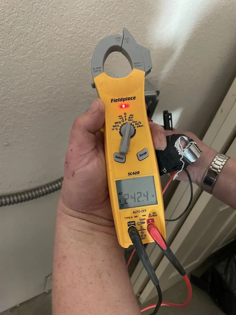 Voltage testing with clamp meter during Electrical Installation Services in Simi Valley